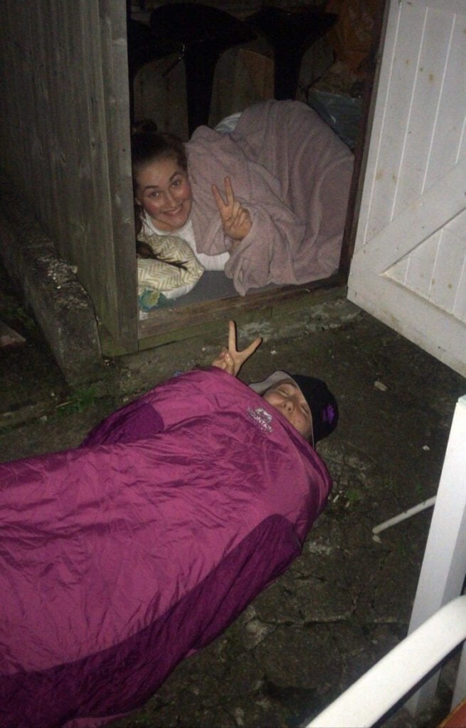 Young people sleeping outside
